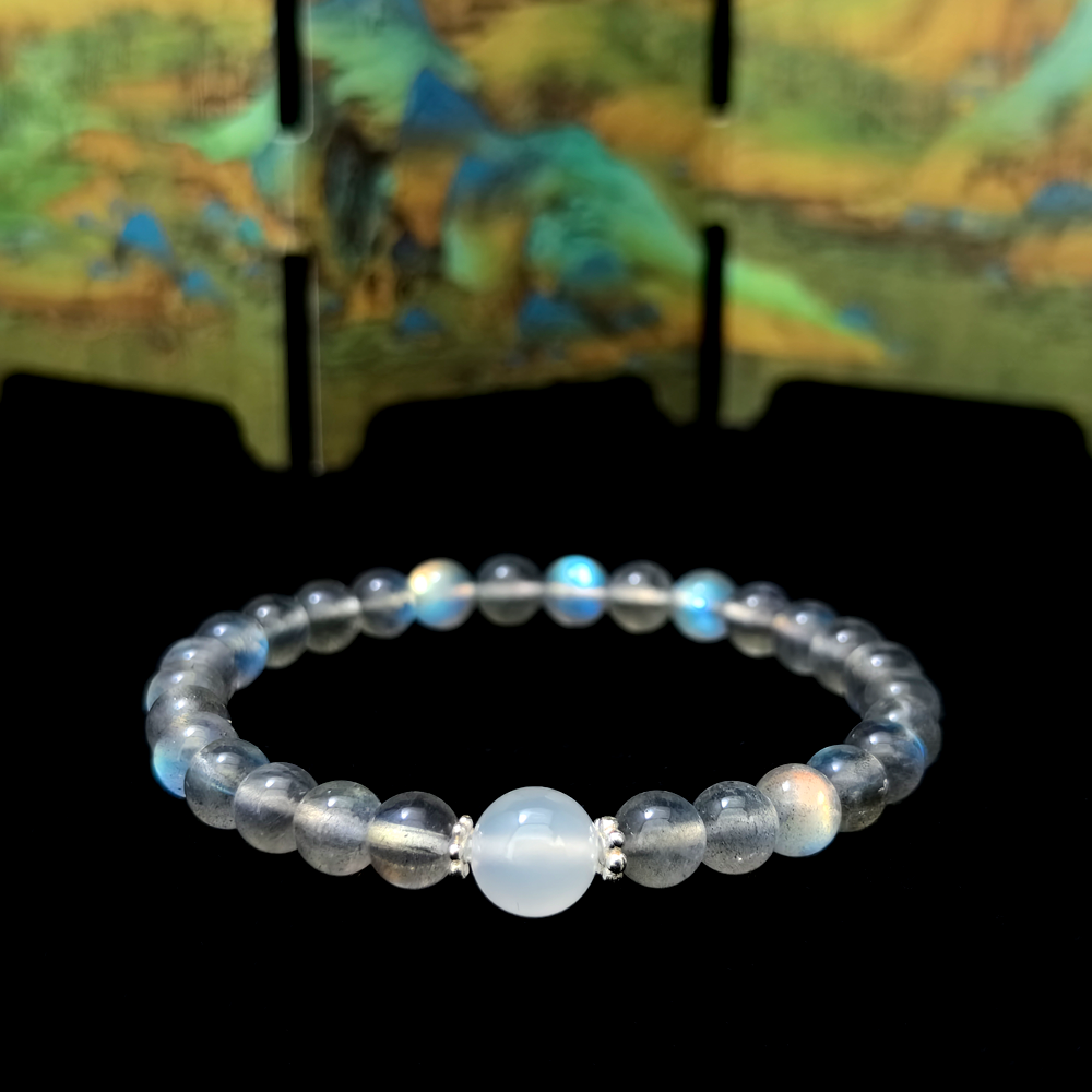 Lunar Rest bracelet in a minimalist scene ¨C Water element crystal for Sleep & Recovery.
