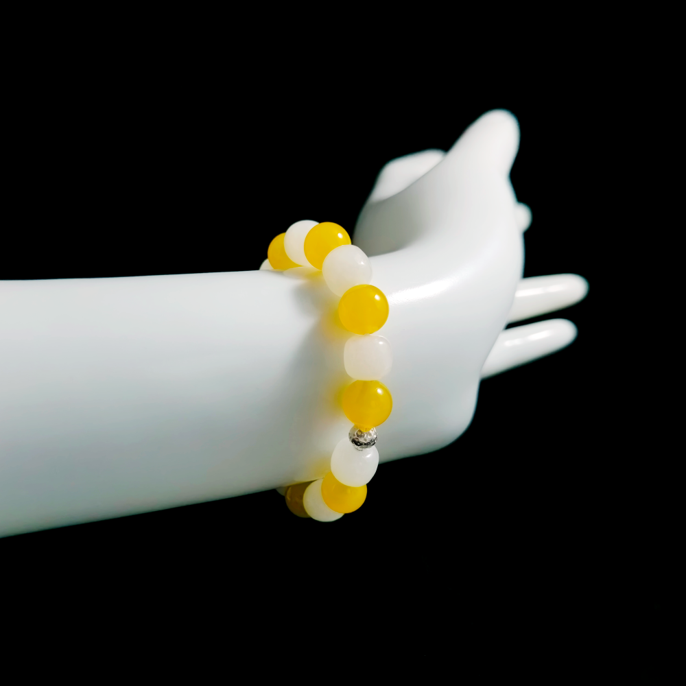Yellow Agate and White Hetian Jade bracelet worn on hand showing emotional steadiness and deeper connection