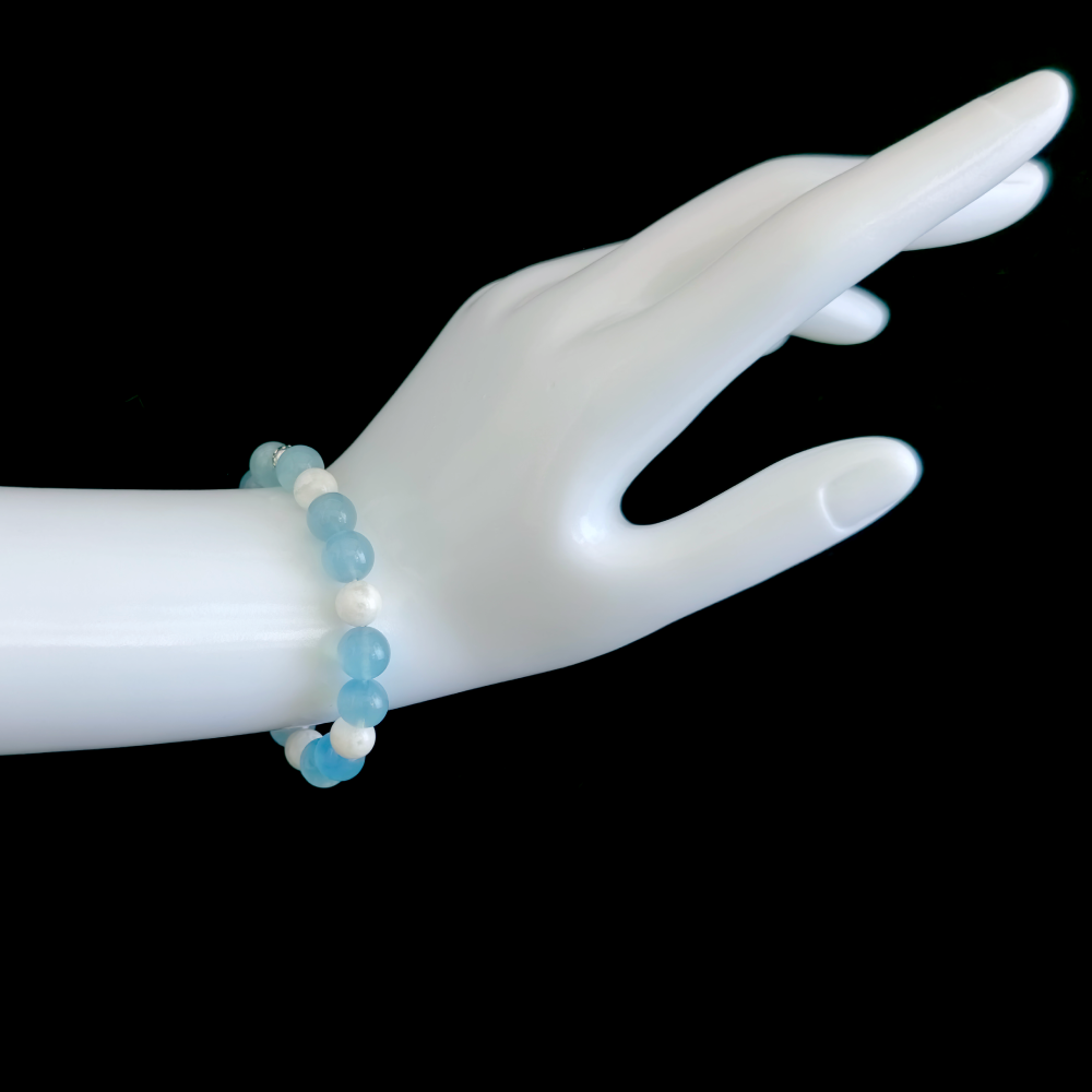 Aquamarine and White Phantom Quartz bracelet worn on hand showing smooth expression and clearer communication