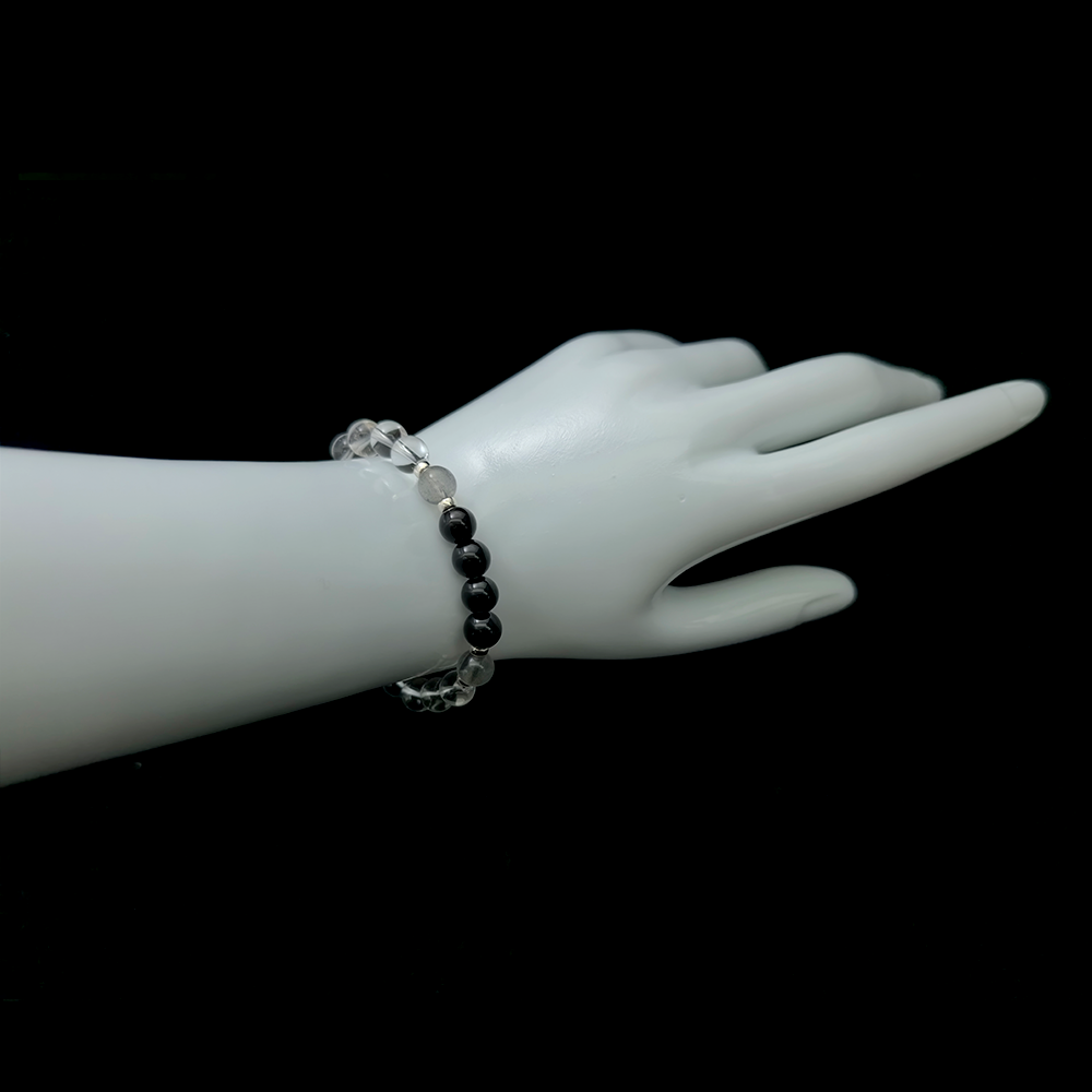 Ember Veil bracelet worn on wrist ¨C handcrafted Feng Shui jewelry for Energy Shielding.