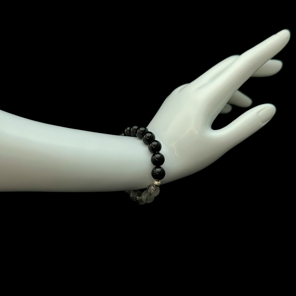 Black Rutilated Quartz and Black Onyx bracelet worn on hand for burnout recovery, emotional reconnection, and grounding support – JING Balance