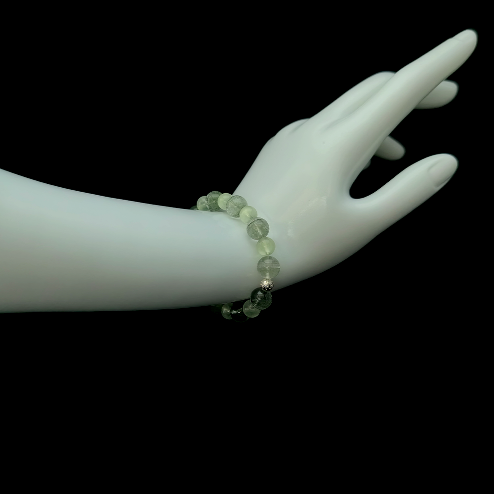Green Phantom Quartz and Prehnite bracelet worn on hand for emotional reconnection, gentle growth, and bringing life back after emotional shutdown – JING Balance