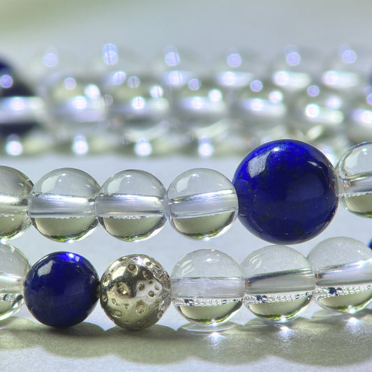 Close-up of Clear Quartz and Lapis Lazuli beads in a crystal bracelet for direct thinking