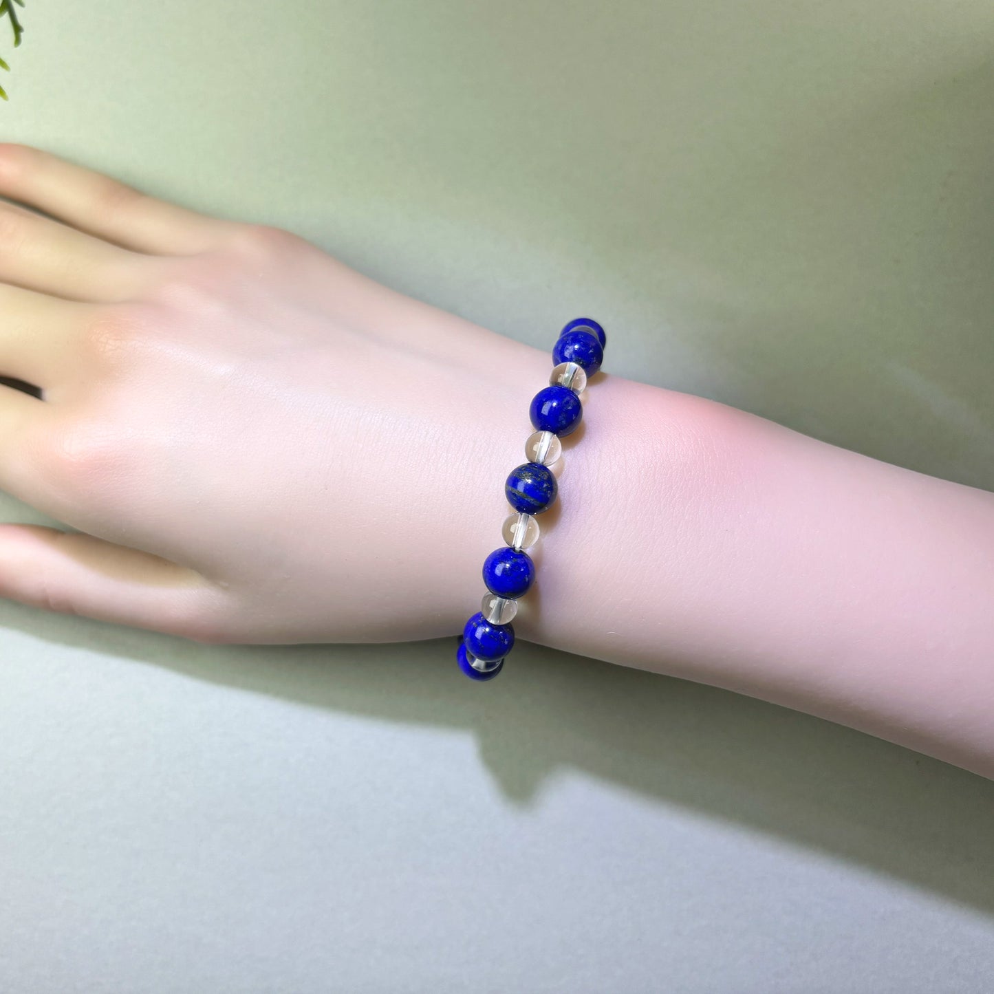 Lapis Lazuli and Clear Quartz bracelet worn on wrist for structured thinking and clear expression