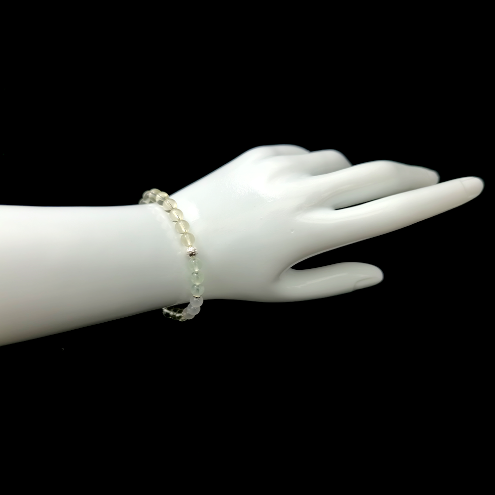 Rooted Clarity bracelet worn on wrist ¨C handcrafted Feng Shui jewelry for Inner Balance.
