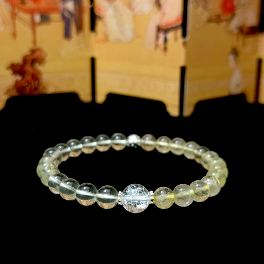 Rooted Abundance bracelet in a minimalist scene ¨C Earth element crystal for Career & Abundance.