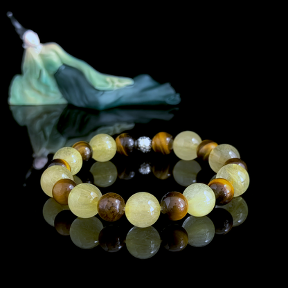Golden Rutilated Quartz and Tiger’s Eye crystal bracelet for recognizing achievements, holding progress, and reducing the urge to move on