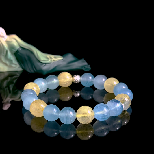 Aquamarine and Golden Rutilated Quartz crystal bracelet for speaking confidence, clear direction, and strong presence