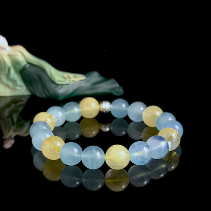 Aquamarine and Golden Rutilated Quartz crystal bracelet for speaking confidence, clear direction, and strong presence