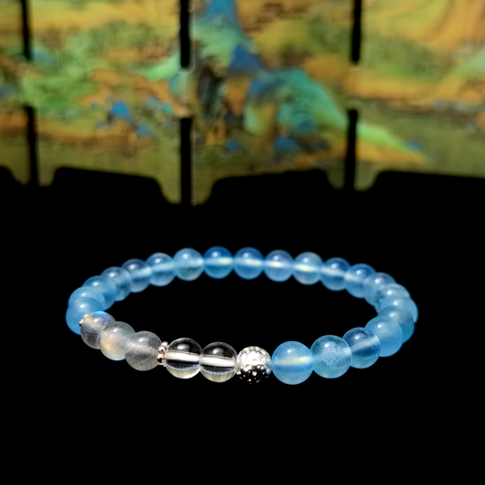 Tide of Clarity bracelet in a minimalist scene ¨C Water element crystal for Inner Balance.