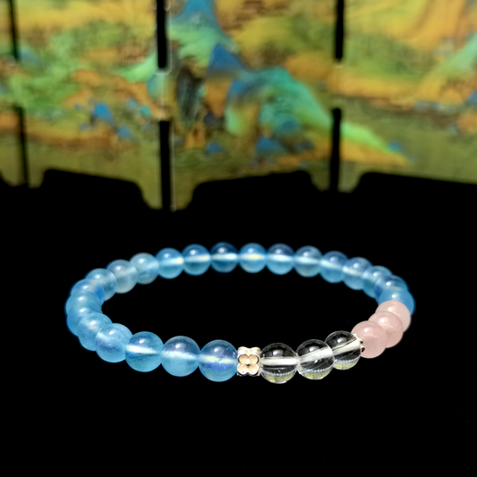 Tides of Tenderness bracelet in a minimalist scene ¨C Water element crystal for Love & Connection.