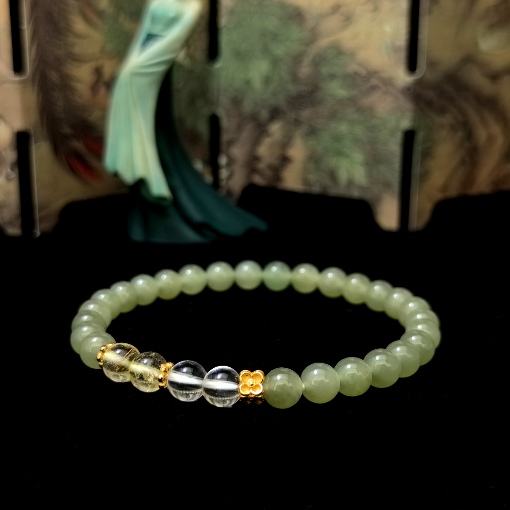 Rooted Prosperity bracelet in a minimalist scene ¨C Wood element crystal for Career & Abundance.