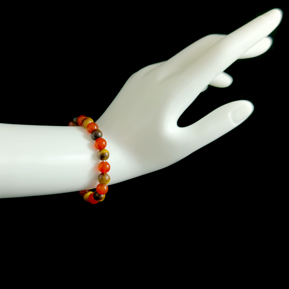 Red Agate and Tiger’s Eye bracelet worn on hand showing consistent action and stable focus