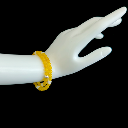 Yellow Agate and White Hetian Jade bracelet worn on hand showing calm completion and a more settled inner state