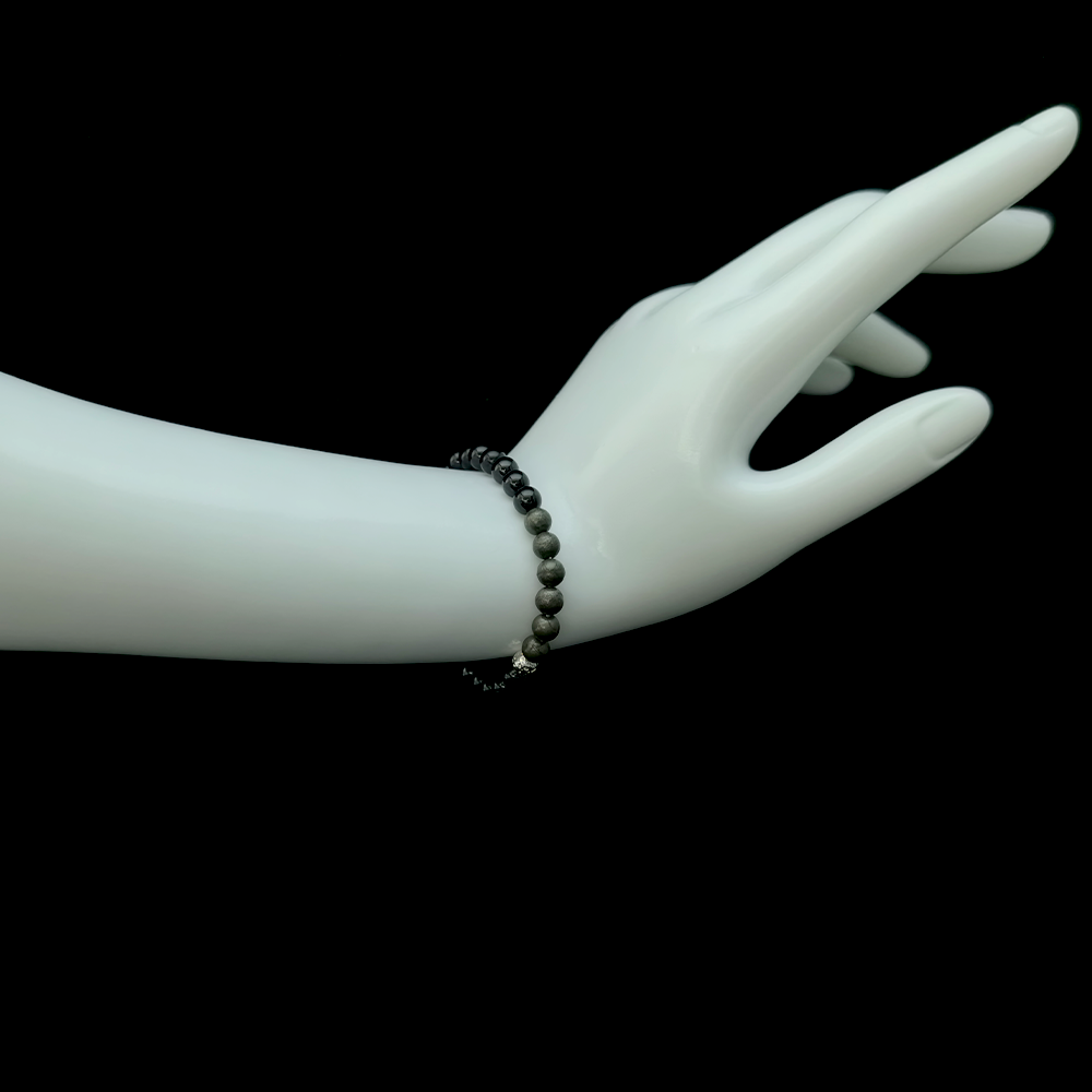 Black Onyx and Pyrite bracelet worn on hand for confident dating, attracting emotionally healthy partners, and grounding self-worth in relationships – JING Balance