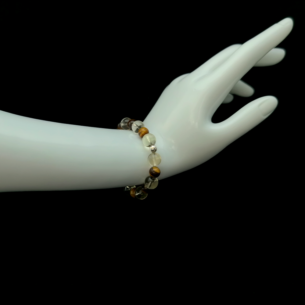 Citrine and Tiger’s Eye bracelet worn on hand for moving on, emotional healing, and releasing past attachments – JING Balance