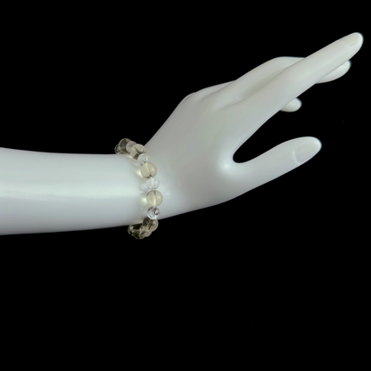 Citrine and Clear Quartz bracelet worn on hand for reducing people-pleasing patterns and preventing emptiness after conversations – JING Balance