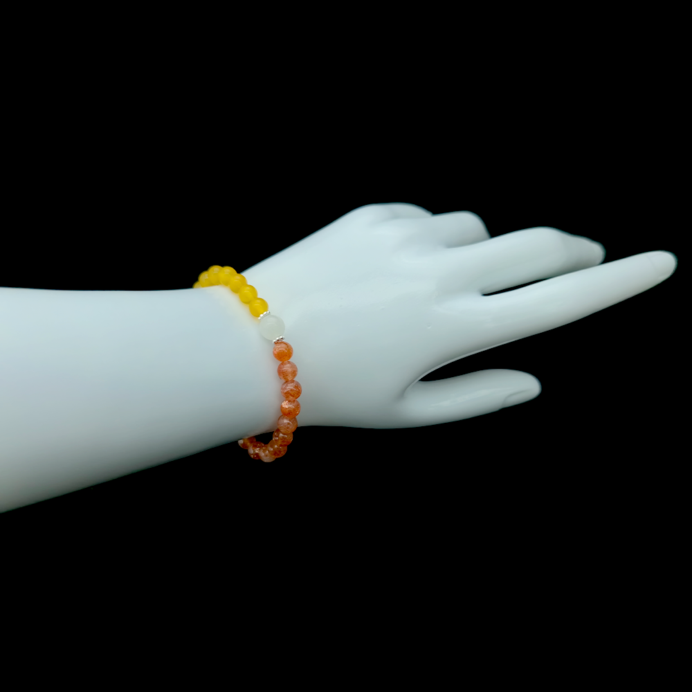 Grounded Radiance bracelet worn on wrist ¨C handcrafted Feng Shui jewelry for Self-Worth & Confidence.