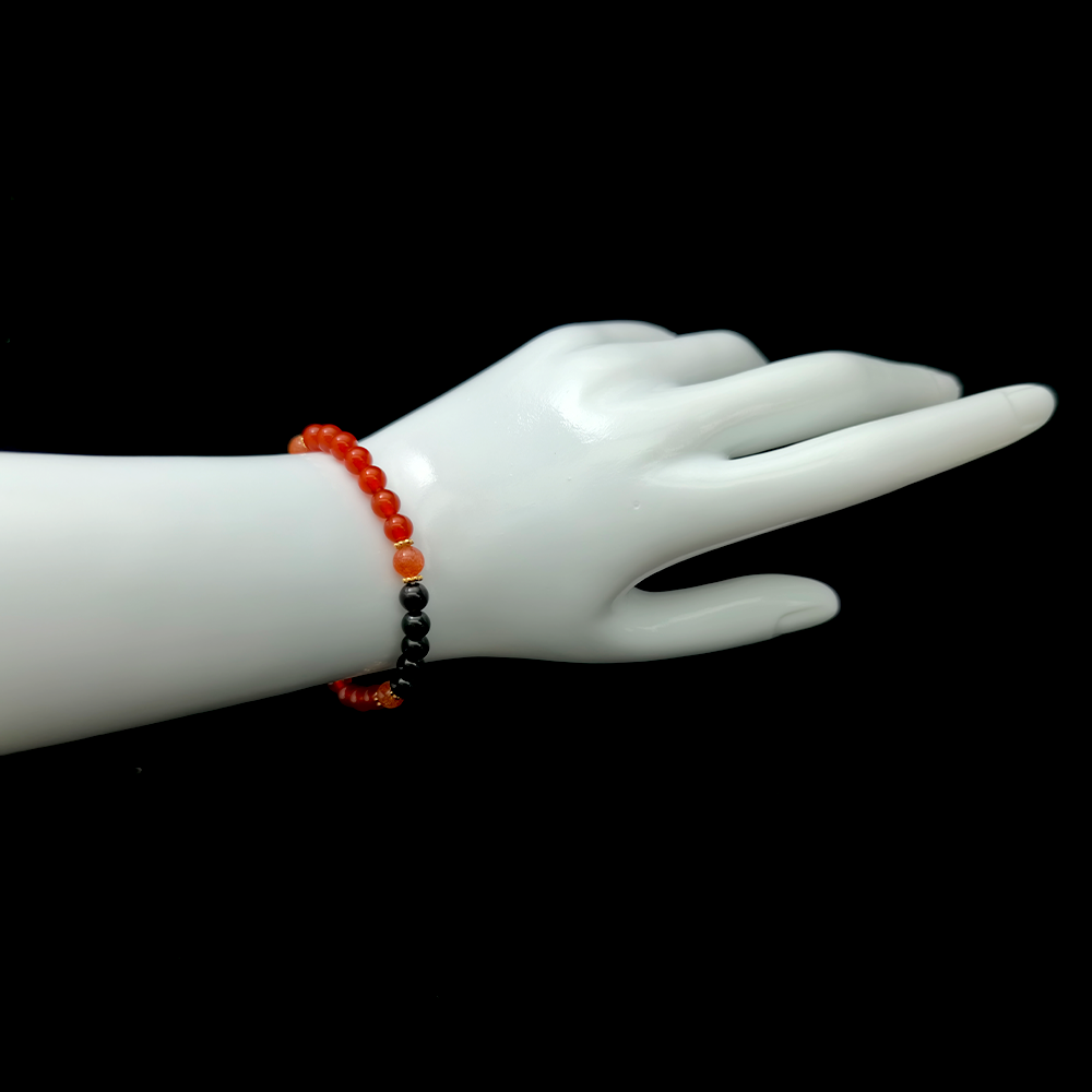 Blazing Shield bracelet worn on wrist ¨C handcrafted Feng Shui jewelry for Energy Shielding.