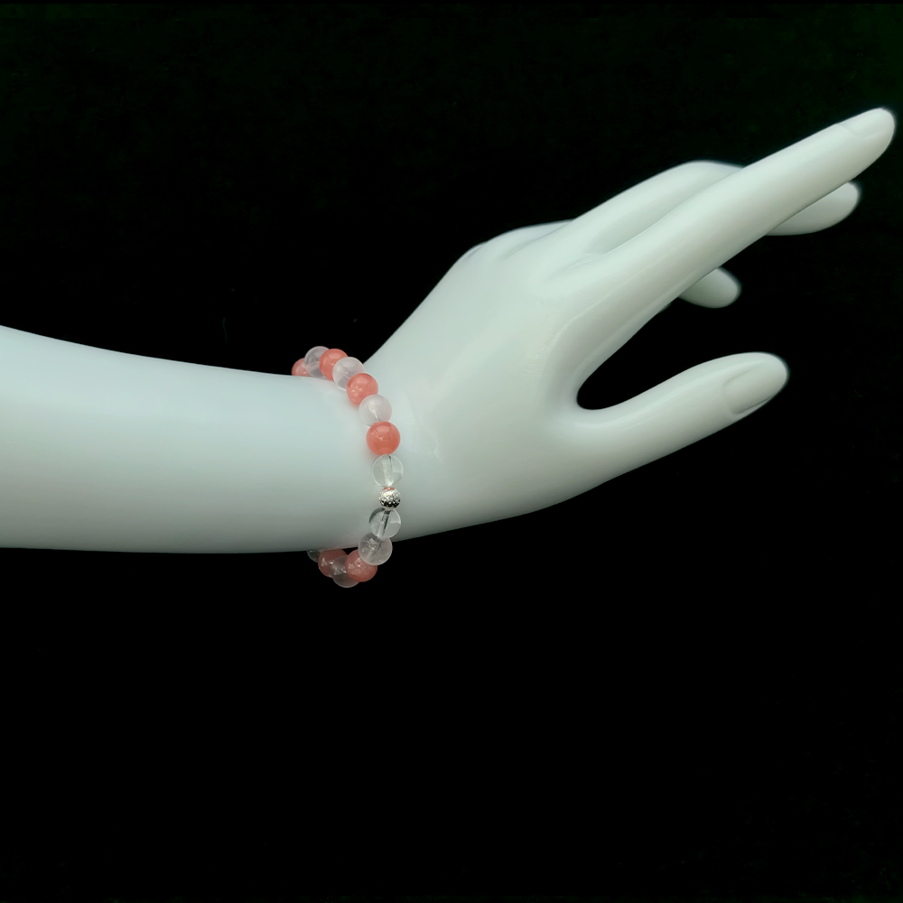 Rose Quartz, Rhodochrosite, and Clear Quartz bracelet worn on hand for self-love, confidence, and feeling worthy of receiving good things – JING Balance