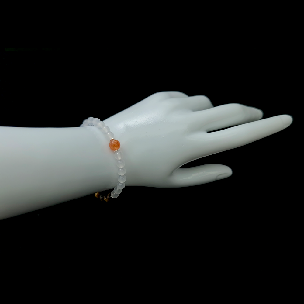 Dawn of Golden Edge bracelet worn on wrist ¨C handcrafted Feng Shui jewelry for Career & Abundance.