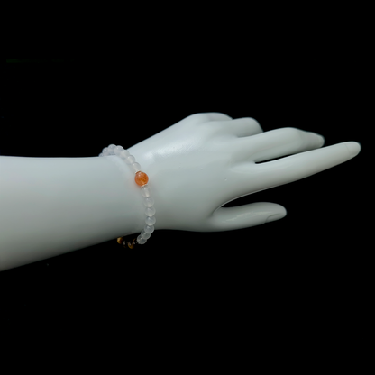 Dawn of Golden Edge bracelet worn on wrist ¨C handcrafted Feng Shui jewelry for Career & Abundance.