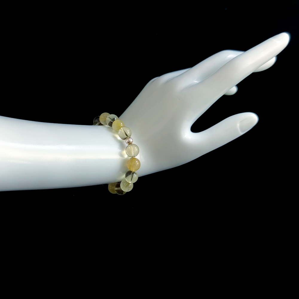 Citrine and Golden Rutilated Quartz bracelet worn on hand for reducing success-driven anxiety, supporting confident action, and building personal momentum without burnout – JING Balance