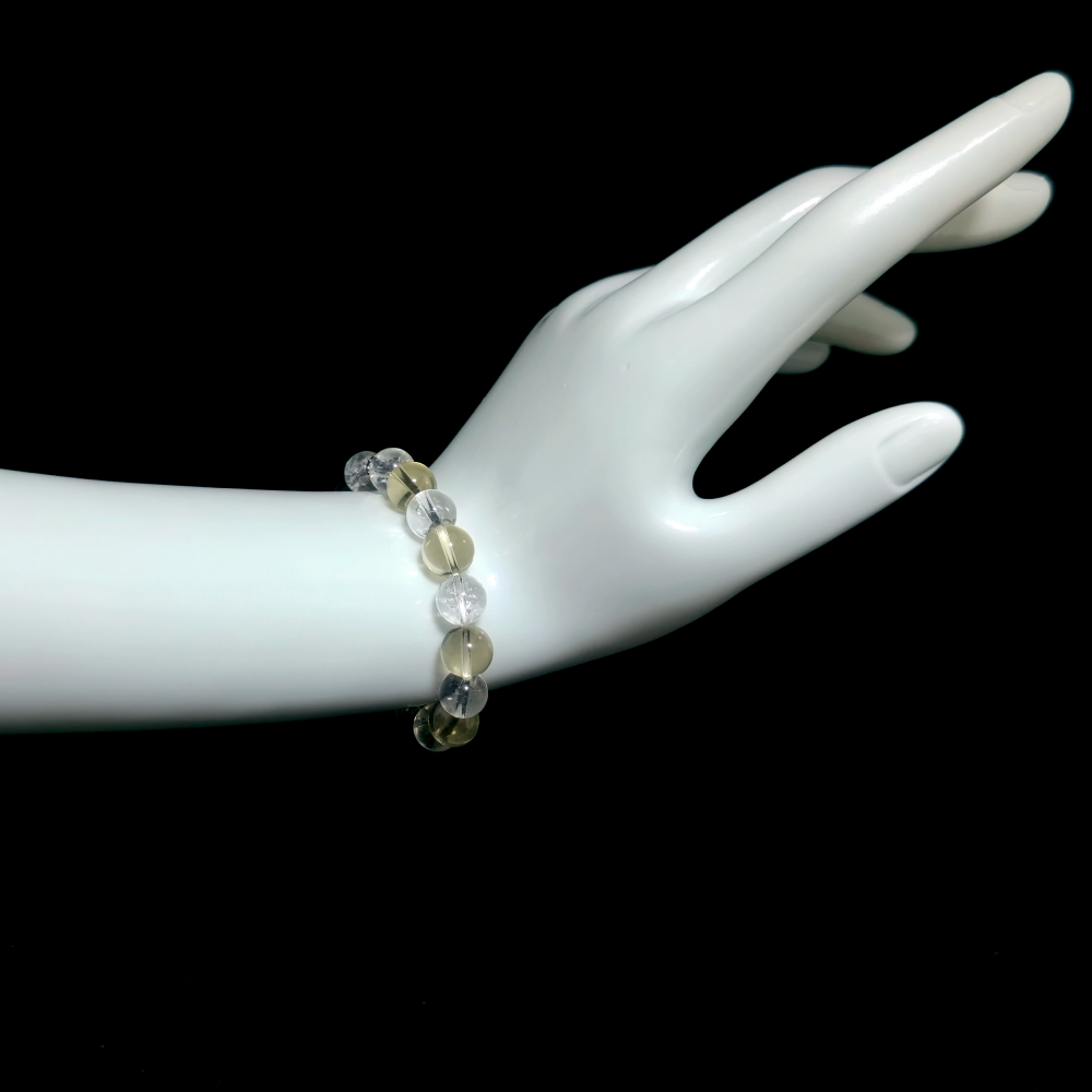 Citrine and Clear Quartz bracelet worn on hand for reducing people-pleasing patterns and preventing emptiness after conversations – JING Balance