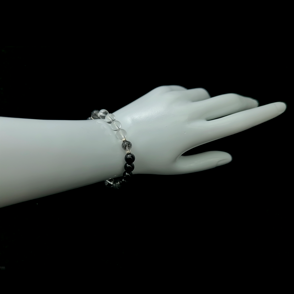 Shadow Shield bracelet worn on wrist ¨C handcrafted Feng Shui jewelry for Energy Shielding.