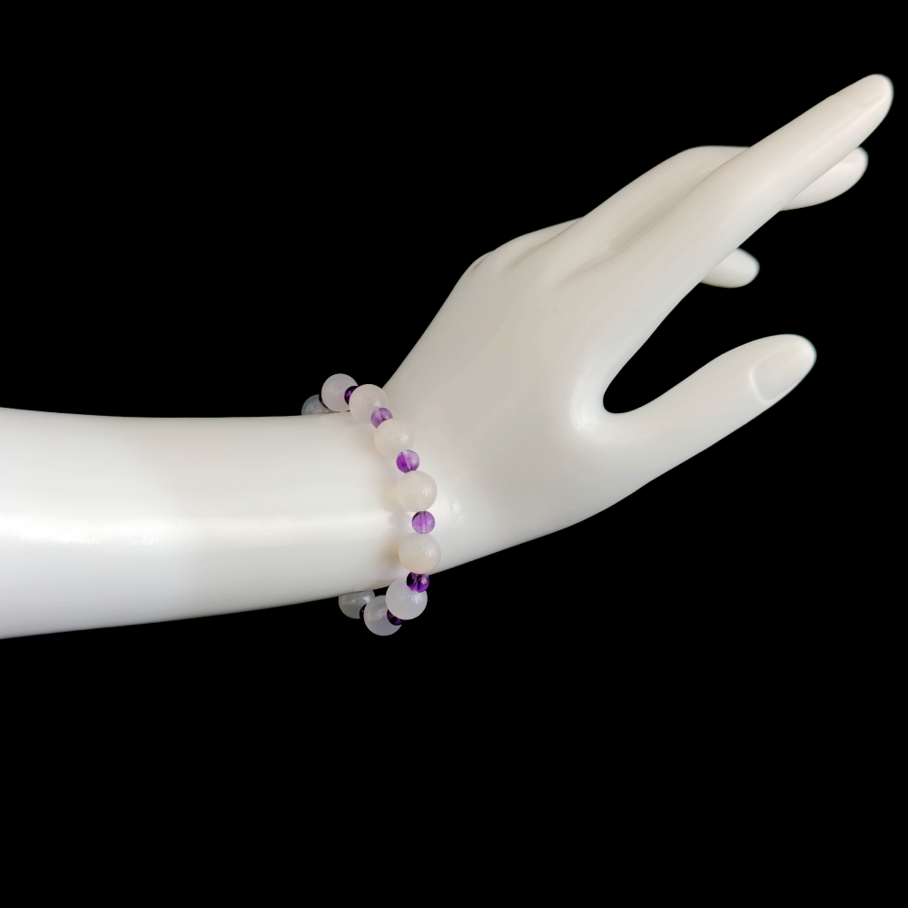 White Agate and Amethyst bracelet worn on hand showing balanced expression and a calmer speaking rhythm