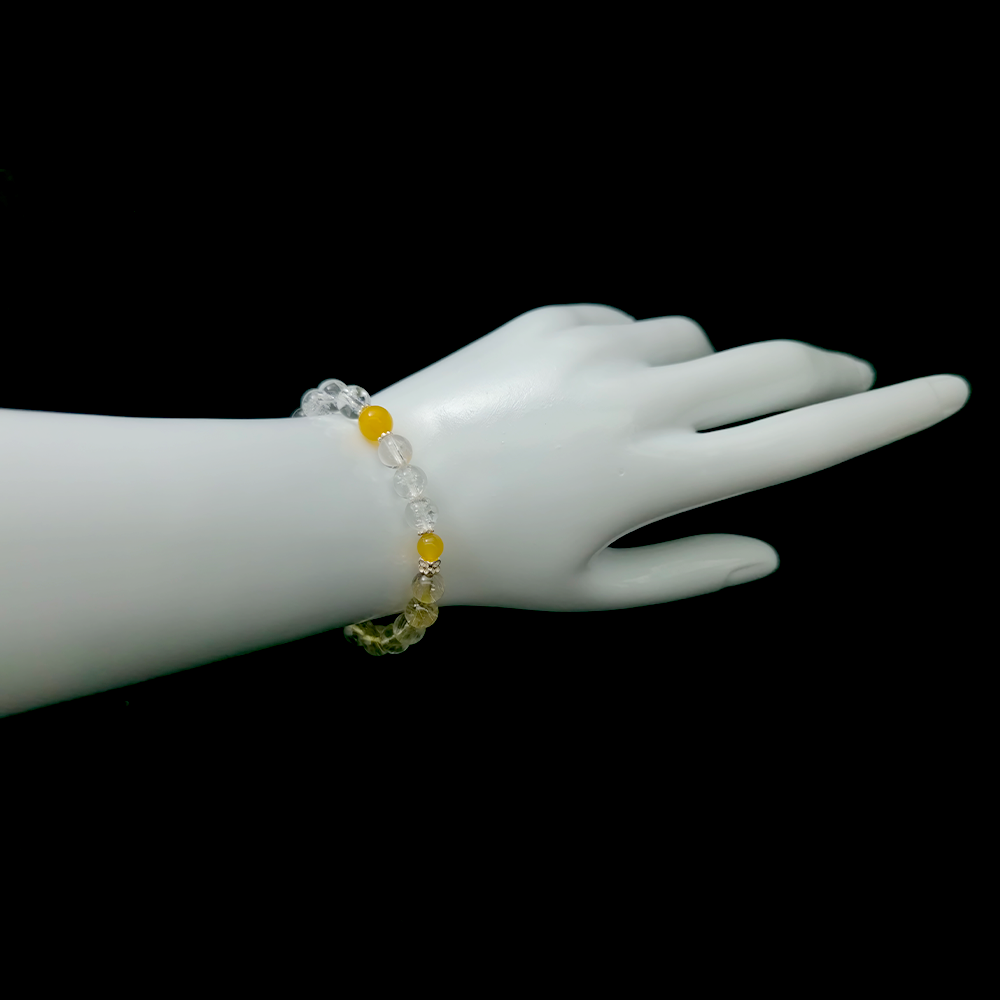 Luminous Root bracelet worn on wrist ¨C handcrafted Feng Shui jewelry for Self-Worth & Confidence.