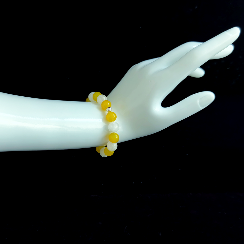 Yellow Agate and White Phantom Quartz bracelet worn on hand for calming comparison stress, stabilizing emotions, and supporting clear self-seeing without self-attack – JING Balance