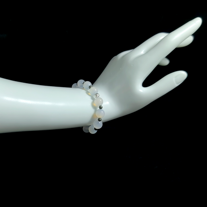 White Agate and Pyrite bracelet worn on hand for easing comparison anxiety and supporting inner security and emotional steadiness – JING Balance