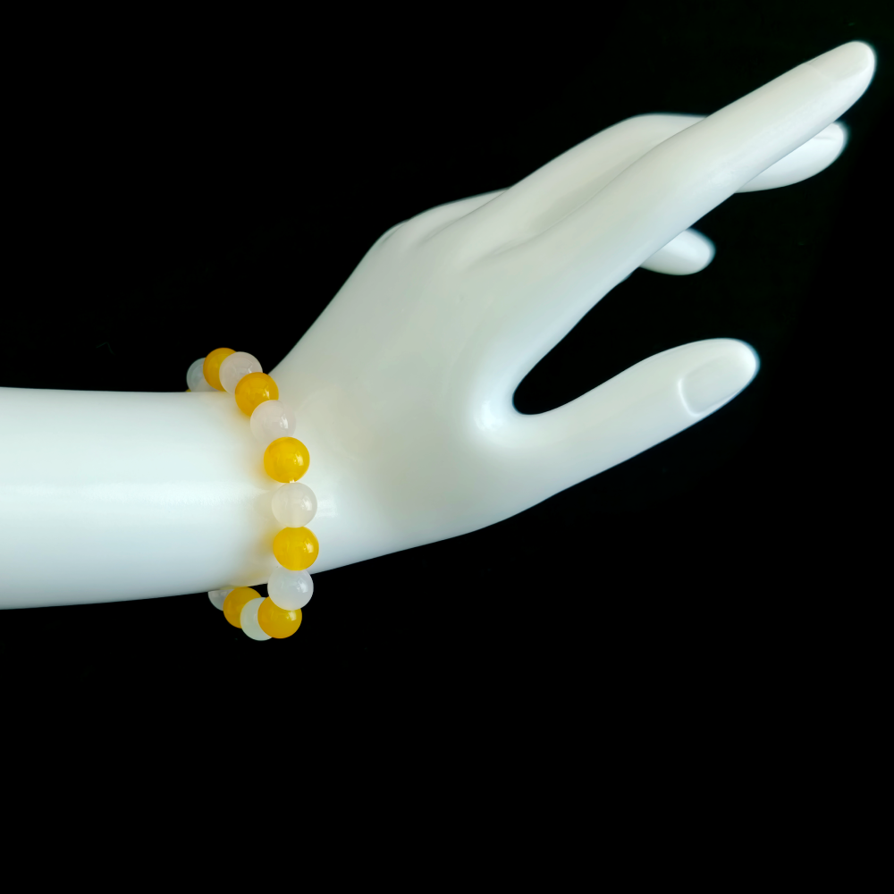 Yellow Agate and White Agate bracelet worn on hand showing a quieter mind and clearer mental closure