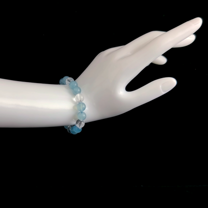 Aquamarine and Clear Quartz bracelet worn on hand showing clear expression and structured communication