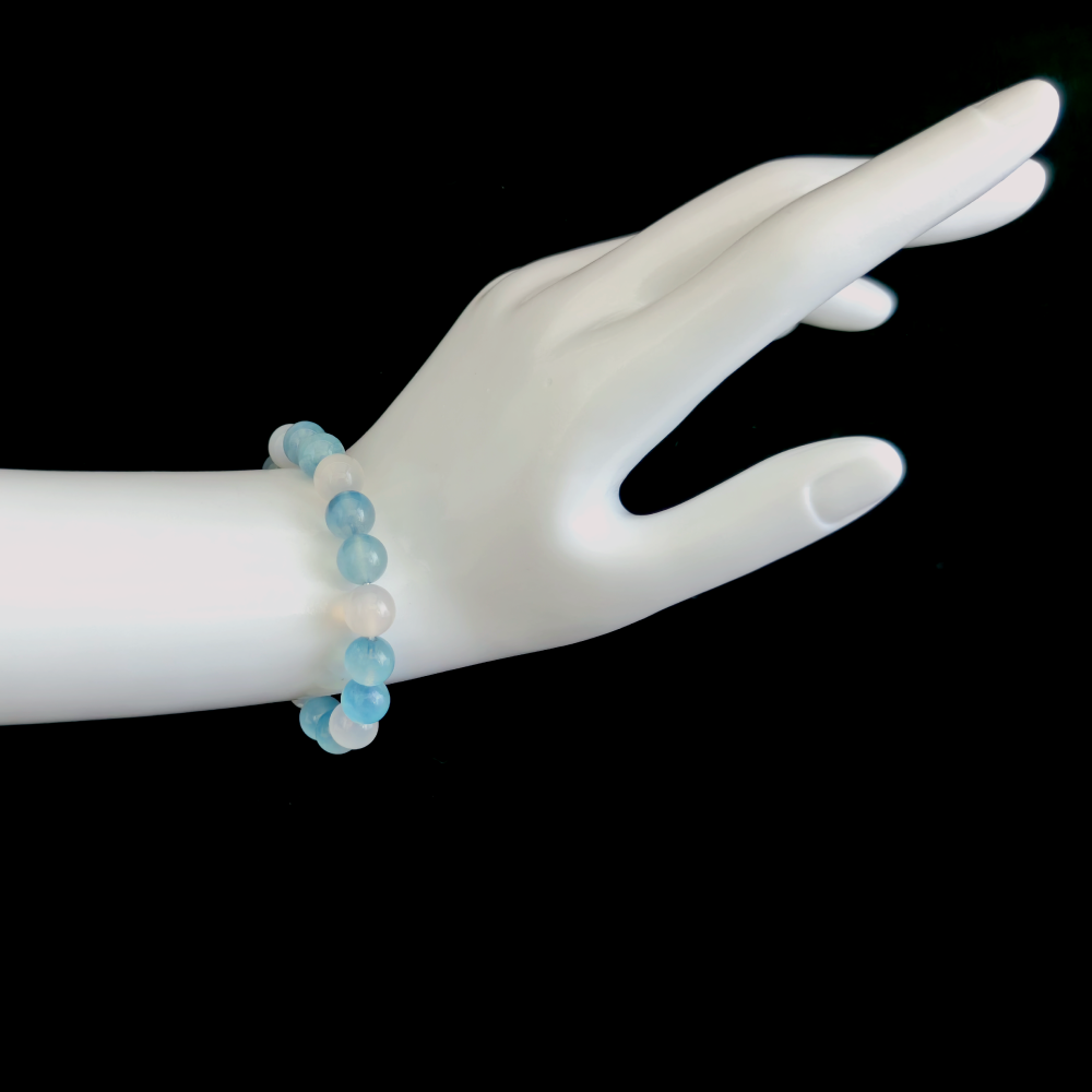 Aquamarine and White Agate bracelet worn on hand showing calm tone and controlled communication