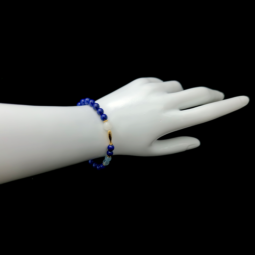 Blue of Becoming bracelet worn on wrist ¨C handcrafted Feng Shui jewelry for Self-Worth & Confidence.