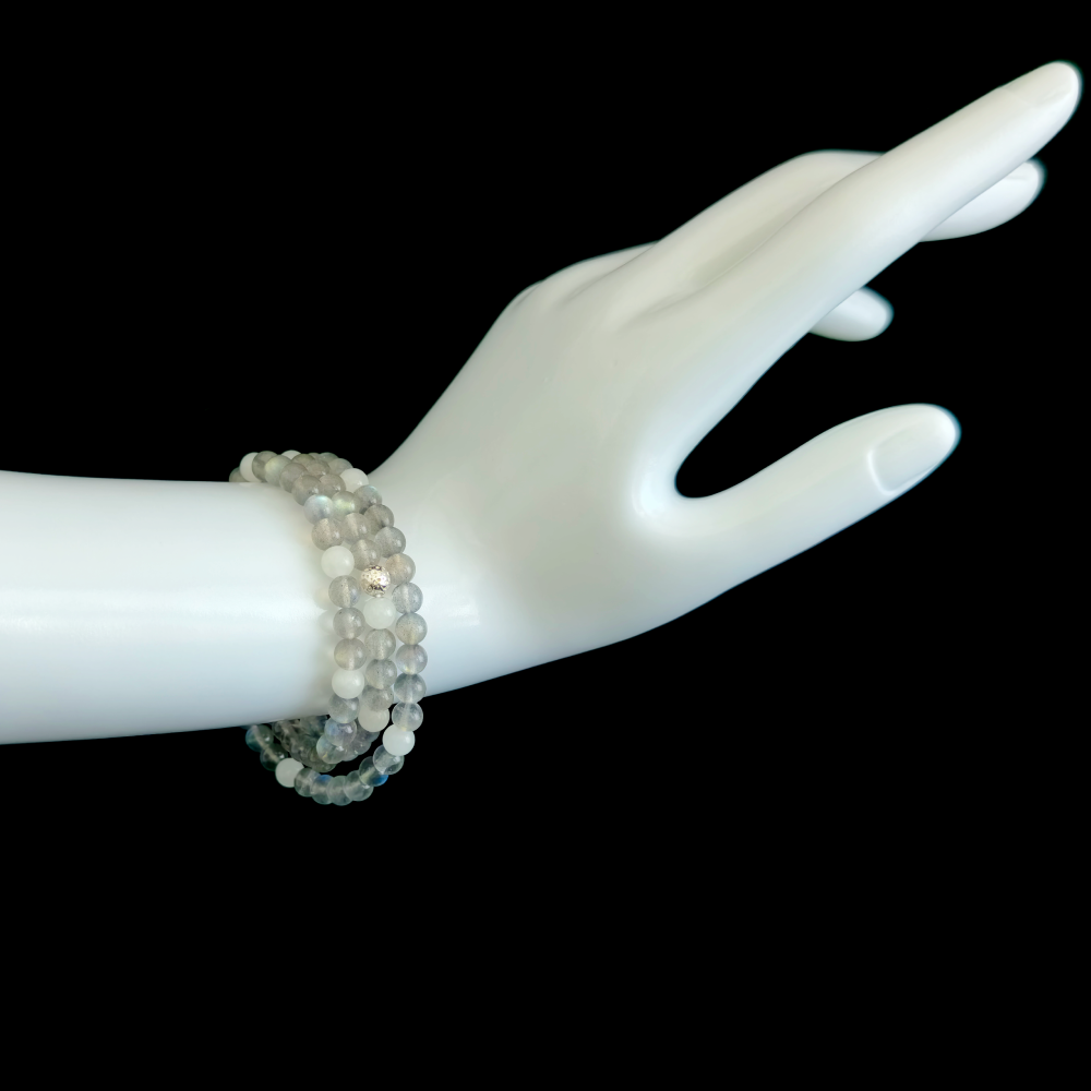 Gray Moonstone and White Hetian Jade bracelet worn on hand showing calm emotions and a settled inner state