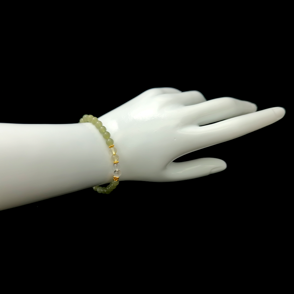 Rooted Prosperity bracelet worn on wrist ¨C handcrafted Feng Shui jewelry for Career & Abundance.
