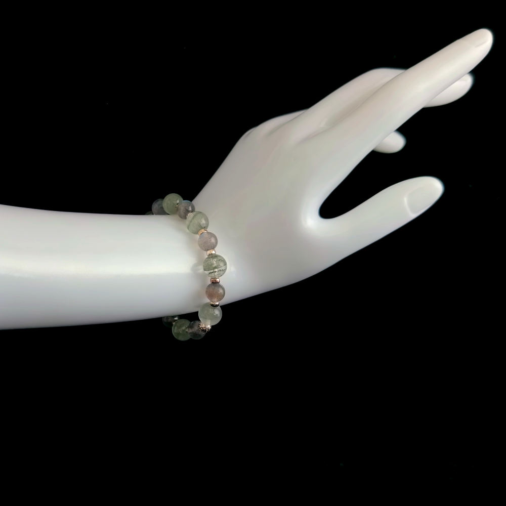 Moonstone and Green Phantom Quartz bracelet worn on hand for slowing rushed speech, softening emotional escalation, and clearer conversations – JING Balance