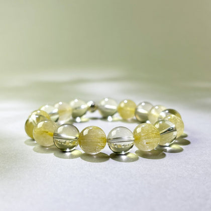 Golden Rutilated Quartz and Citrine crystal bracelet for nothing feels like it counts