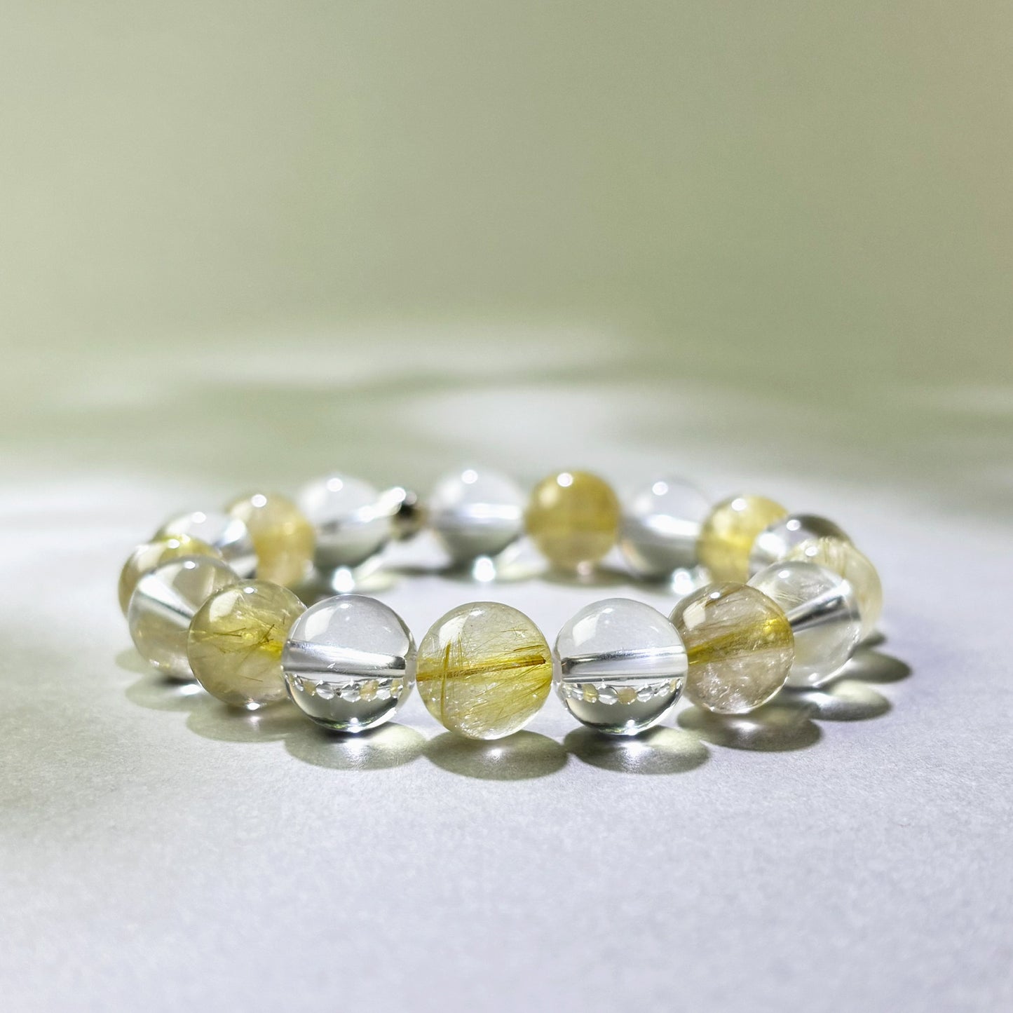 Golden Rutilated Quartz and Clear Quartz crystal bracelet for overexplaining
