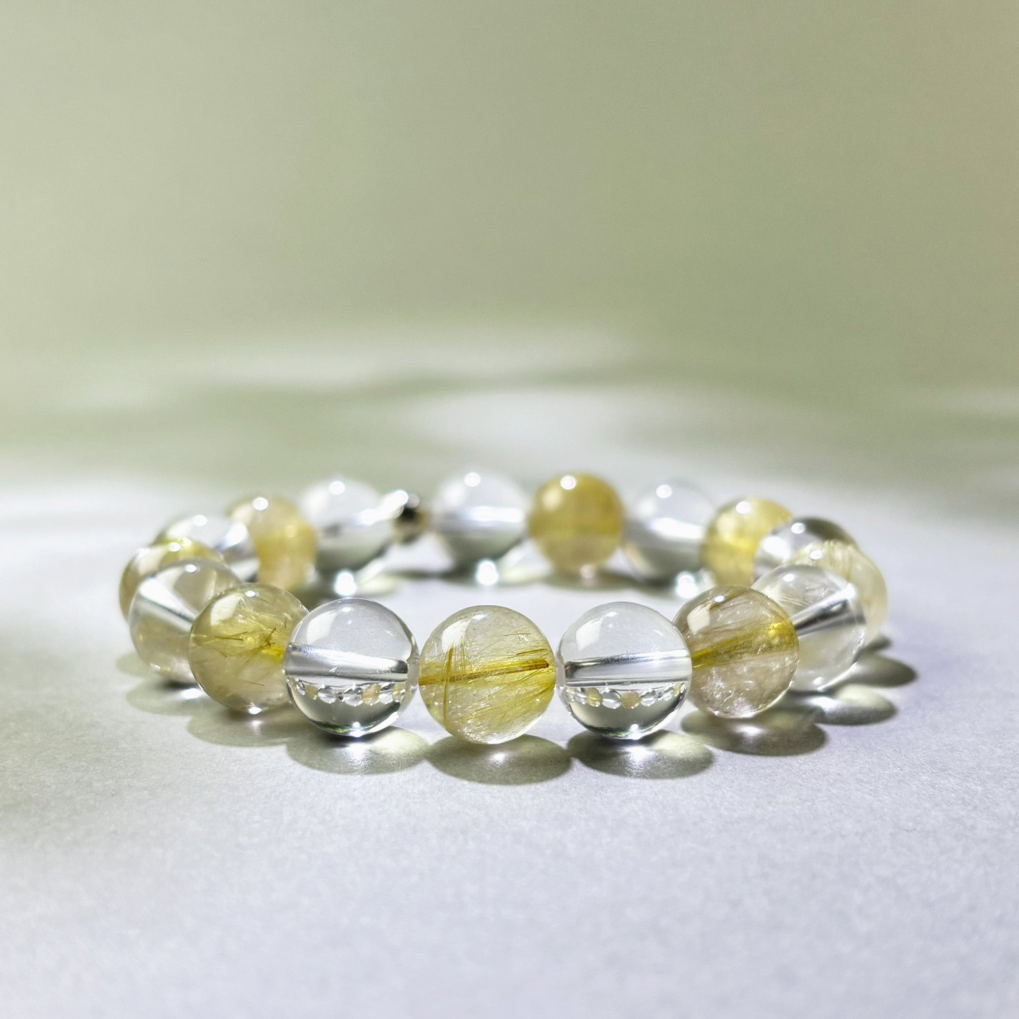 Golden Rutilated Quartz and Clear Quartz crystal bracelet for overexplaining