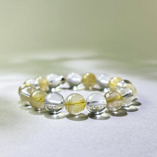 Golden Rutilated Quartz and Clear Quartz crystal bracelet for overexplaining