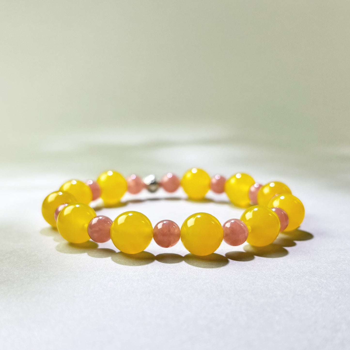 Yellow Agate and Rhodochrosite crystal bracelet for can’t let go and emotional numbness
