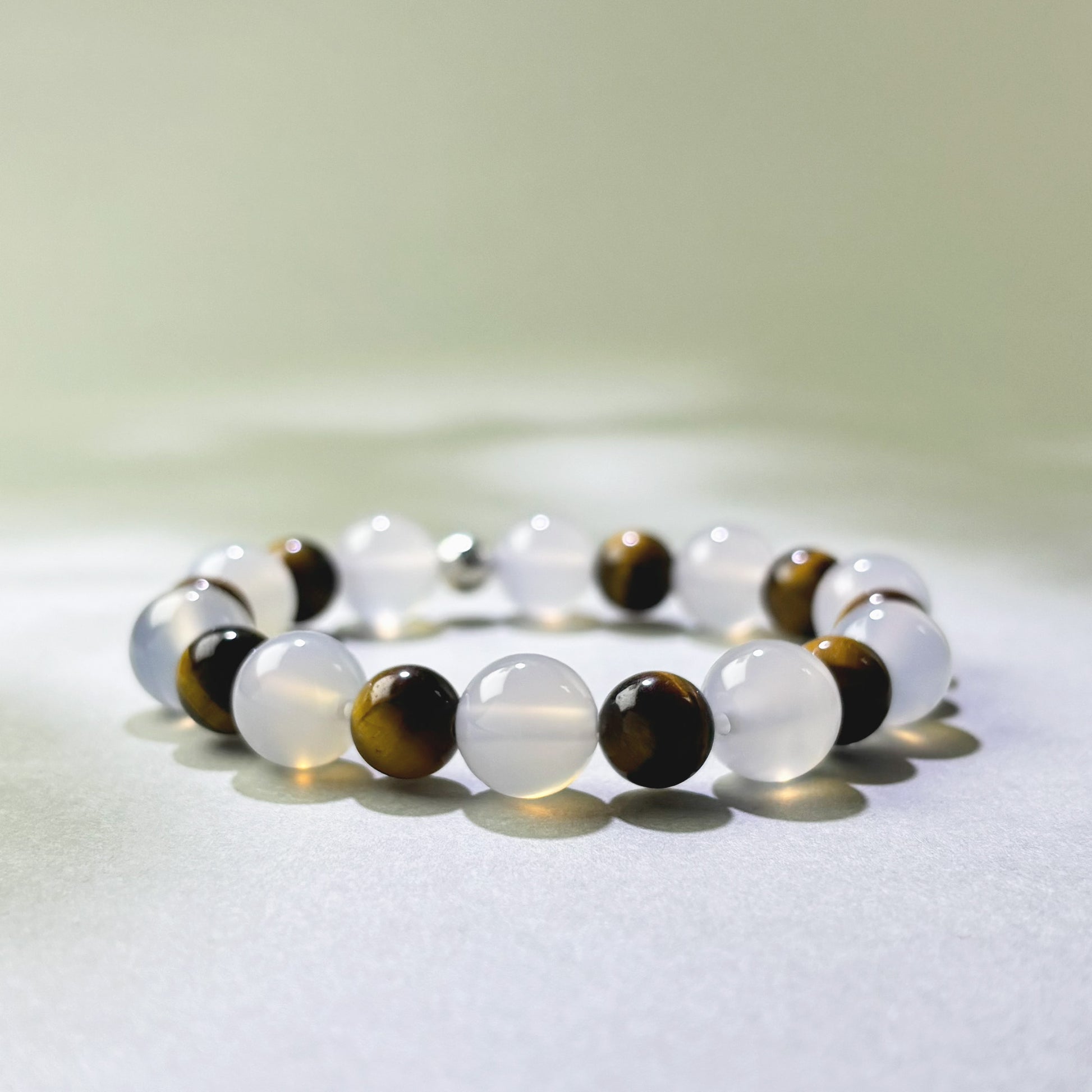 White Agate and Tiger’s Eye crystal bracelet for overchecking and letting go