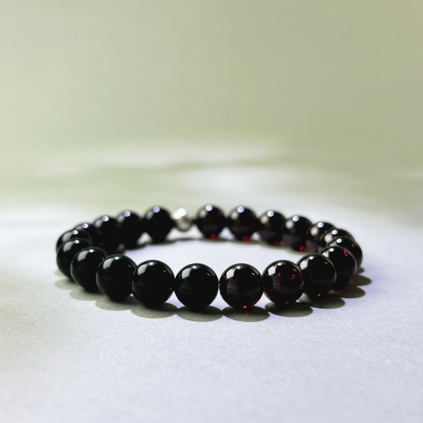 Garnet and Black Tourmaline crystal bracelet for emotional numbness and inner warmth