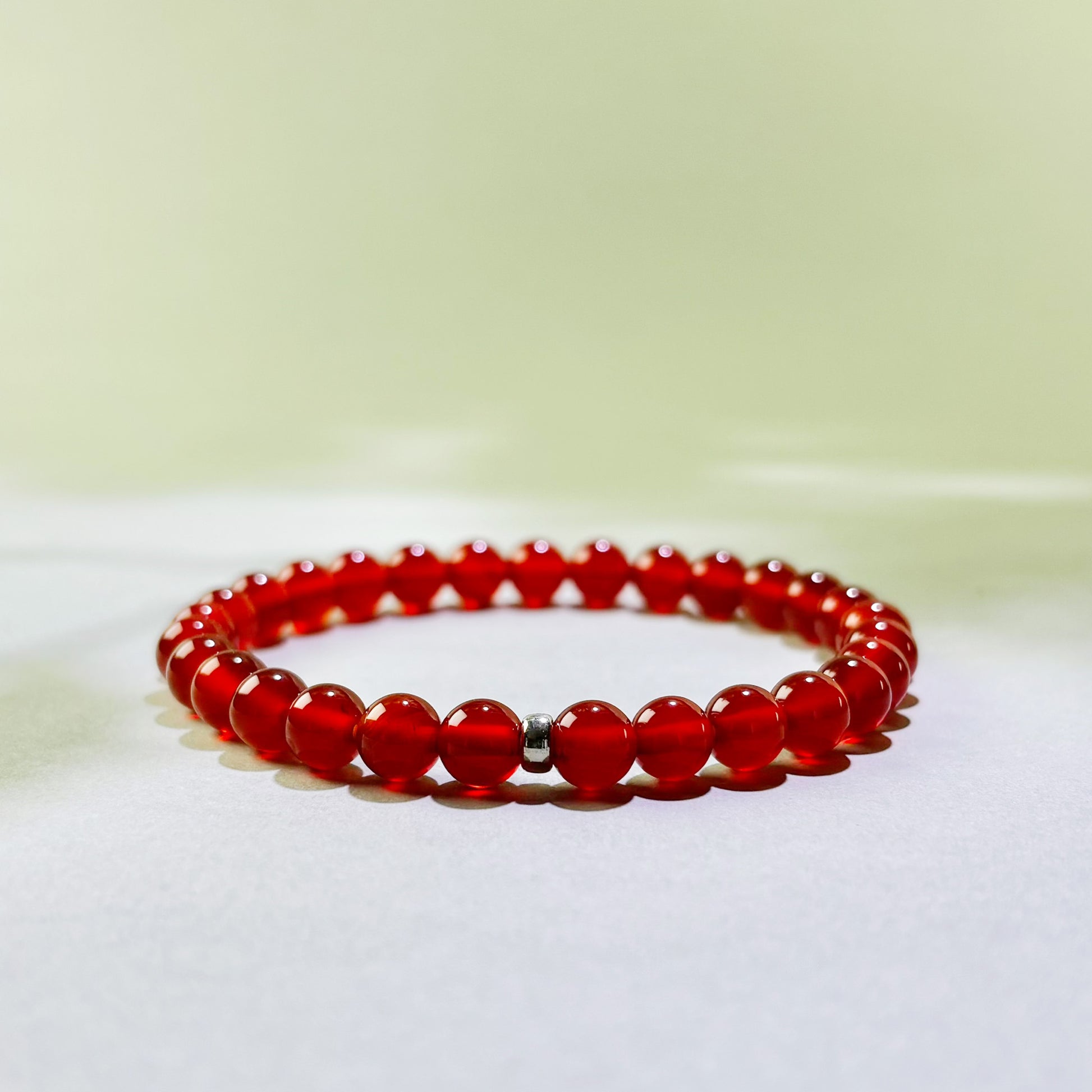Carnelian crystal bracelet for motivation, taking action, and difficulty getting started