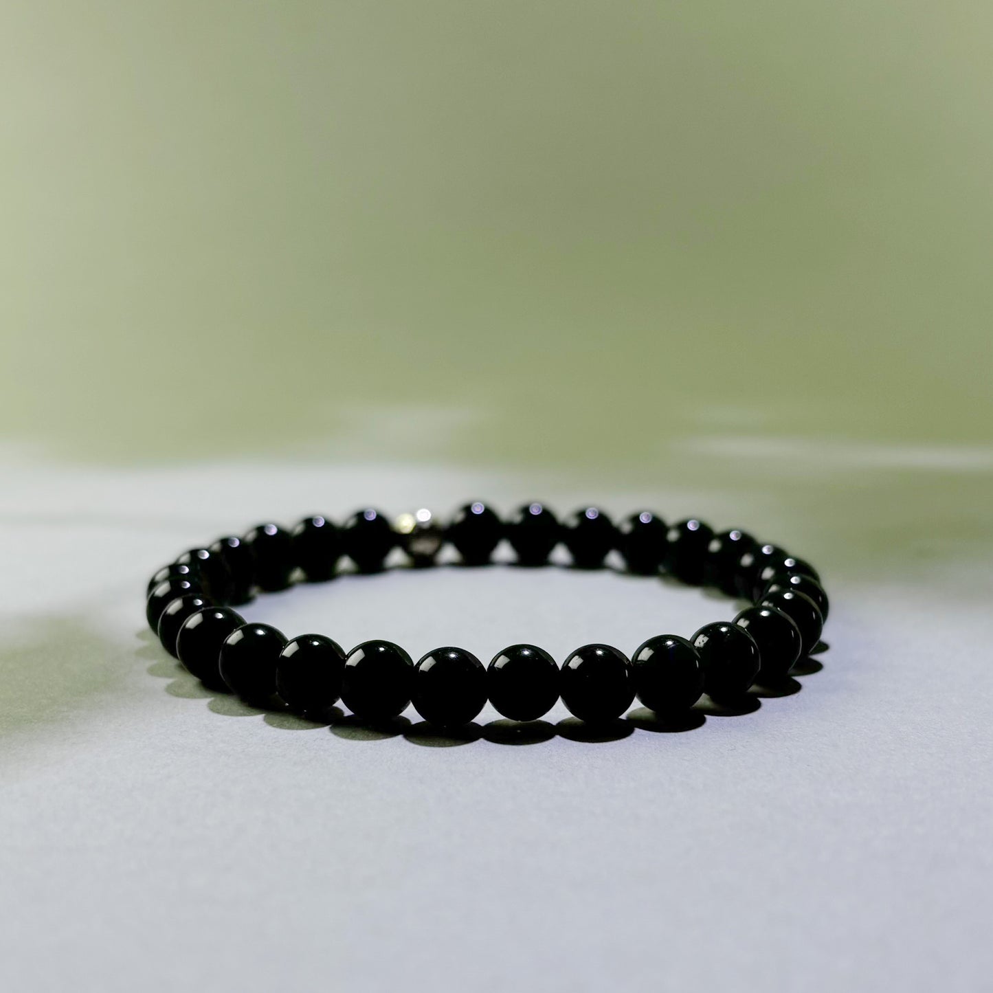 Black Tourmaline and Obsidian crystal bracelet for energy protection and releasing stress after difficult environments