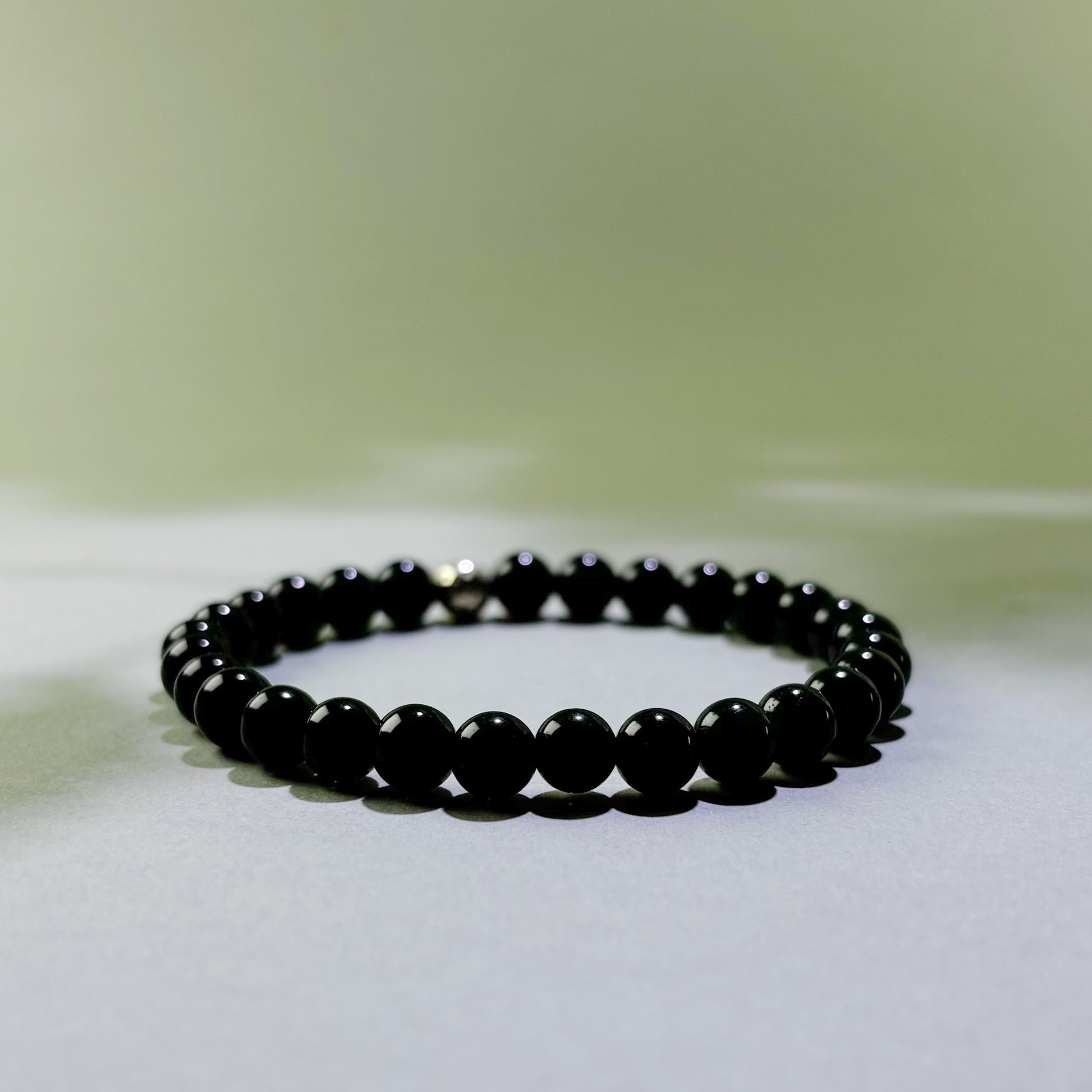 Black Tourmaline and Obsidian crystal bracelet for energy protection and releasing stress after difficult environments